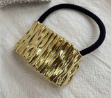 Coletero liga para el cabello metálico (varios modelos)