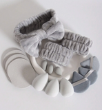 Kit de bolsas, esponjas y banditas skin care
