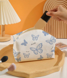 Cosmetiquera de mariposas (varios tonos)