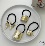 Coletero liga para el cabello metálico (varios modelos)