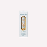 labial Bridgerton, The Art of Arrival, labial rojizo quemado, lipstick Bridgerton, labial en barra, maquillaje de labios, labial de alta pigmentación, labial cruelty free, aroma a frambuesa, colección Bridgerton