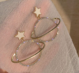 Aretes planeta con piedras