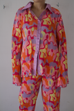 Conjunto de pantalón print naranja morado y rosa