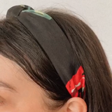 Diadema negra flores rojas