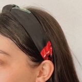 Diadema negra flores rojas